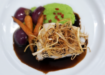 Common Mora with balsamic vinegar reduction,<br>pea puree<br>baby vegetables